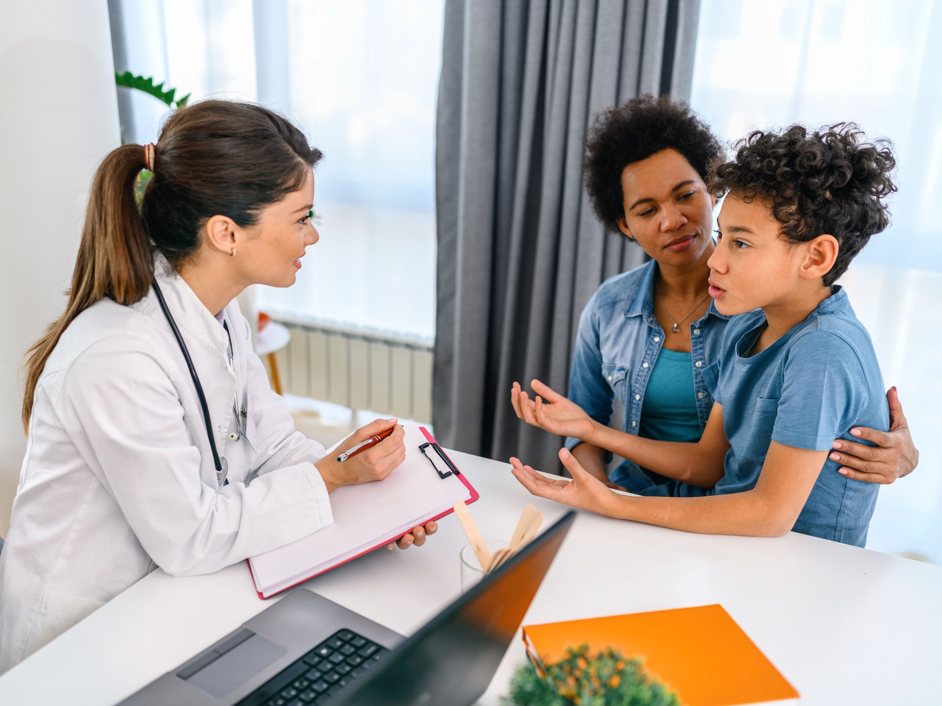 Black boy having a medical exam at doctor's office