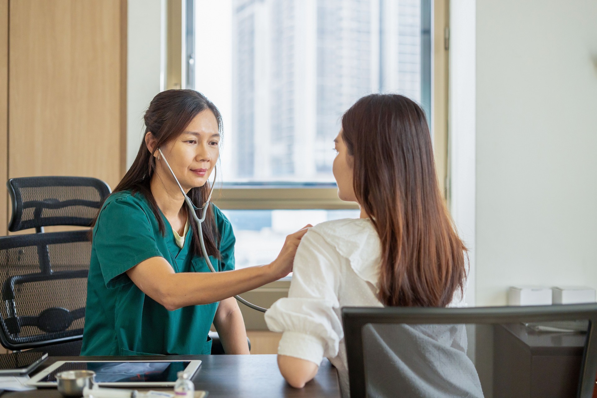 Doctor Consulting Patient in Modern Clinic